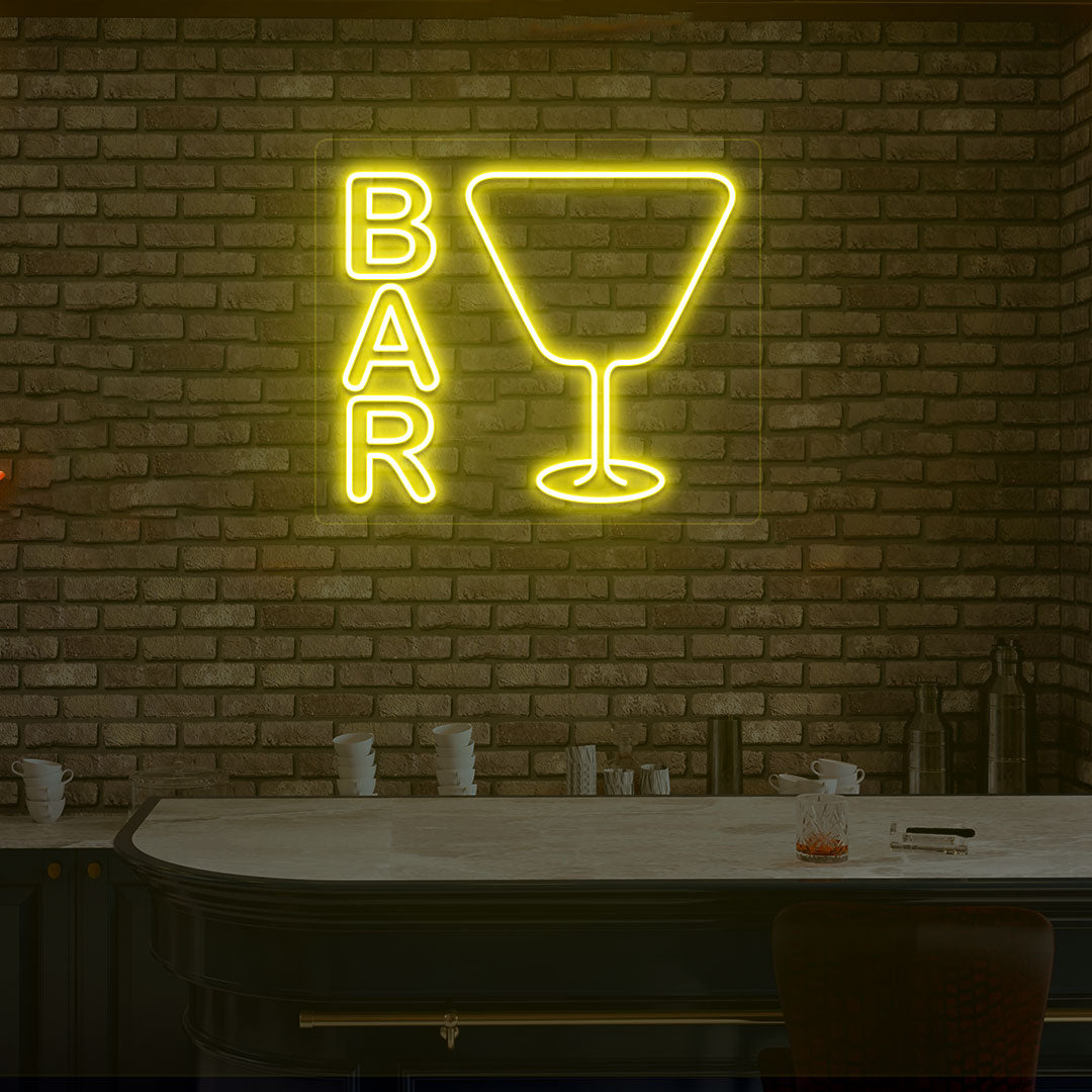 Image of a bar LED neon sign with a glass symbol on a modern bar wall in yellow color.