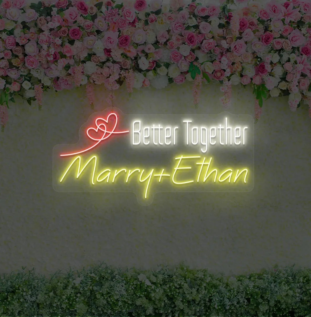 Personalized Better Together neon sign with custom names mounted on modern wedding backdrop wall in yellow color.