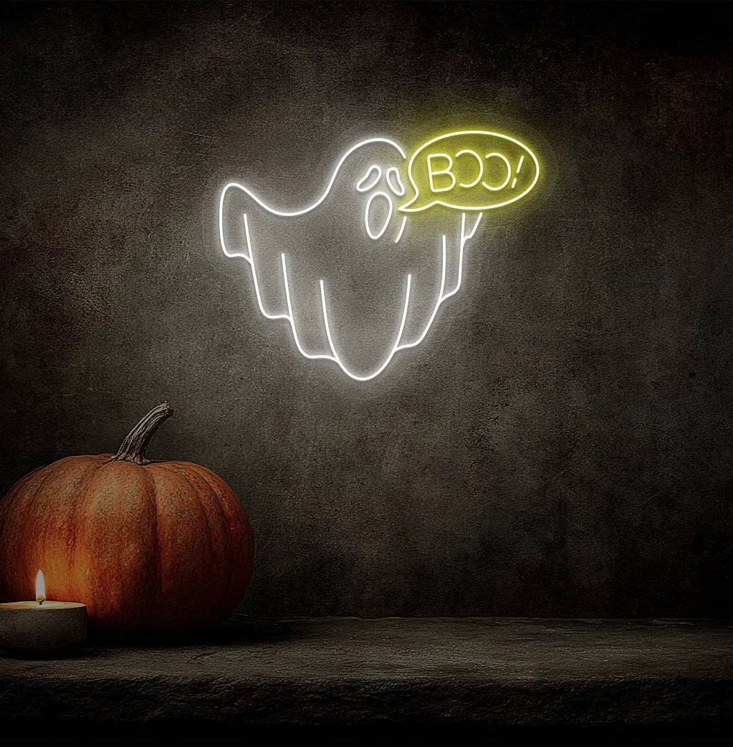 Boo Ghost LED Neon Sign with yellow glow on a spooky Halloween themed wall.