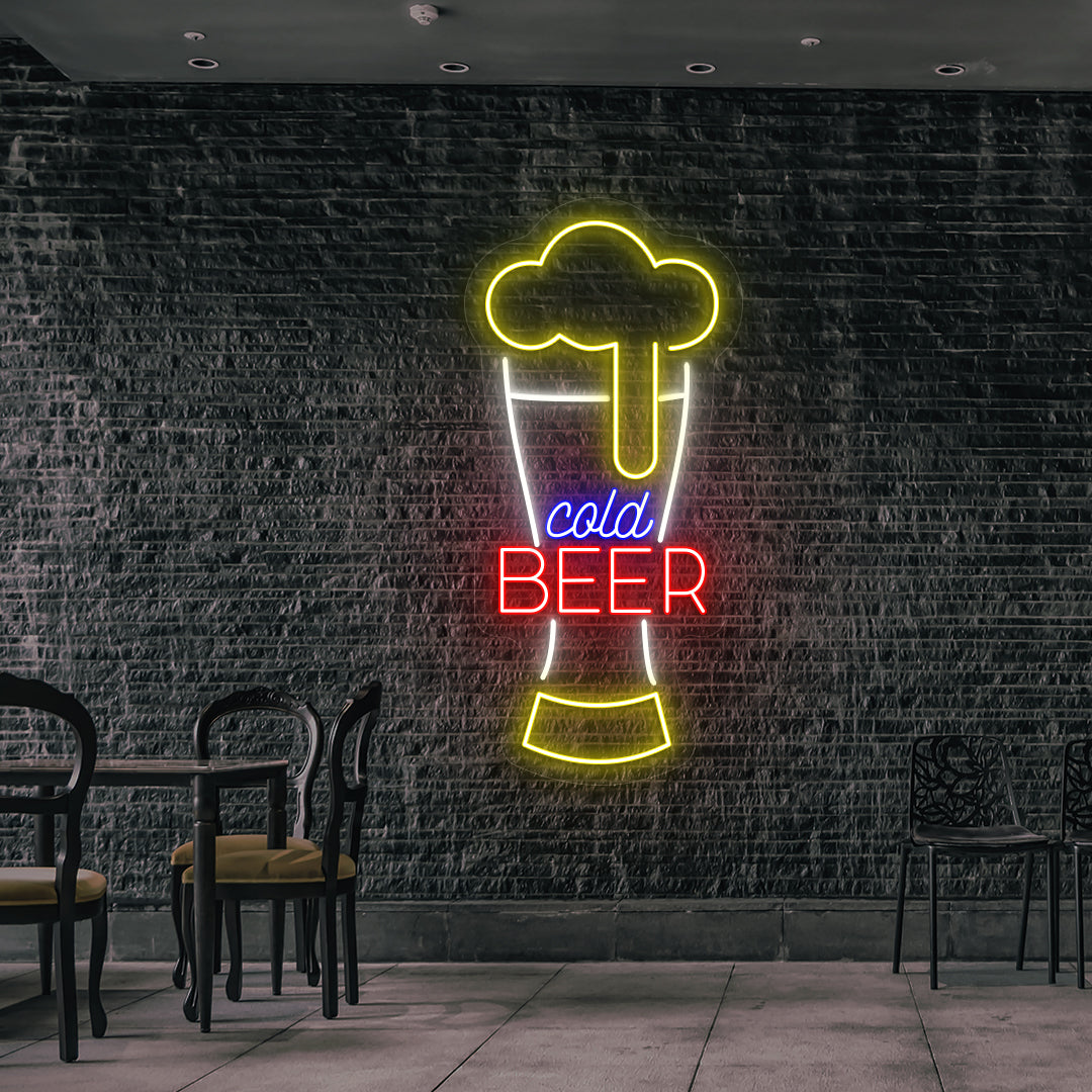 Stylish cold beer glass neon sign glowing multicolor on wall.