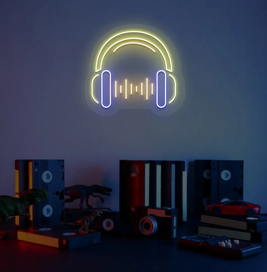 Modern aesthetic room with headphone neon sign glowing yellow.