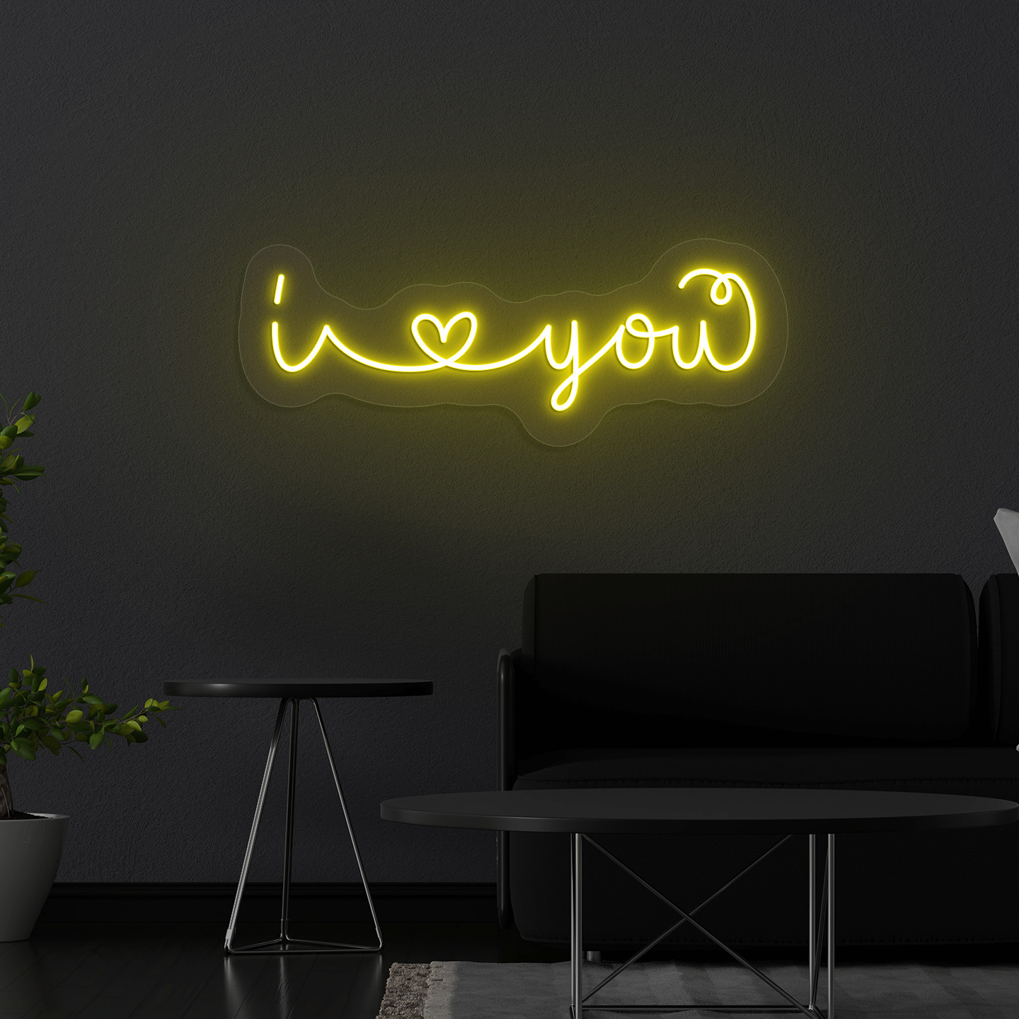 Stylish "I love you" LED neon mounted on wall in yellow.