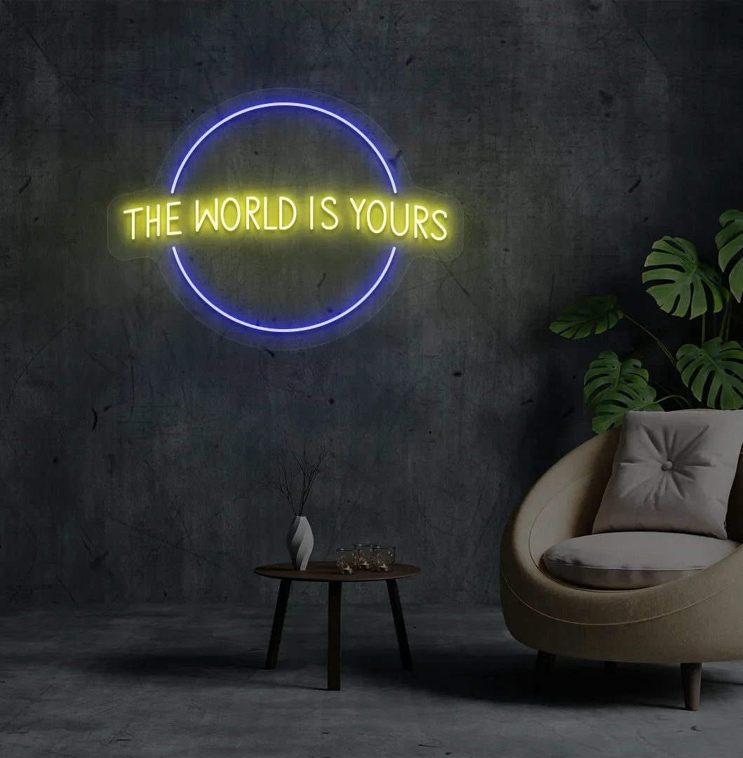 Image of a stylish This World Is Yours neon sign mounted on aesthetic room wall in yellow color.