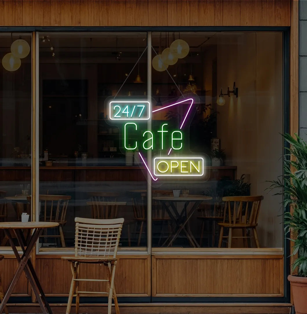 Trendy 24/7 cafe open neon sign in green mounted on coffee shop wall.