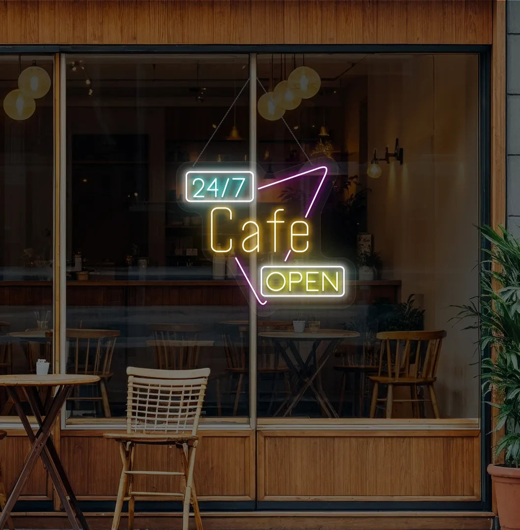 Trendy 24/7 cafe open neon sign in orange mounted on coffee shop wall.
