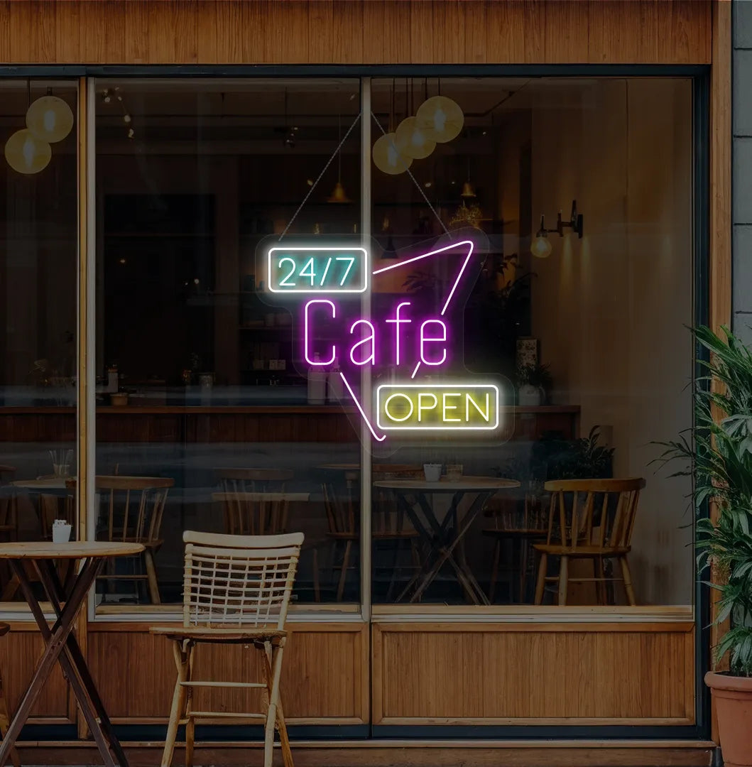 Image of a stylish 24/7 cafe open neon sign in pink mounted on cafe wall.