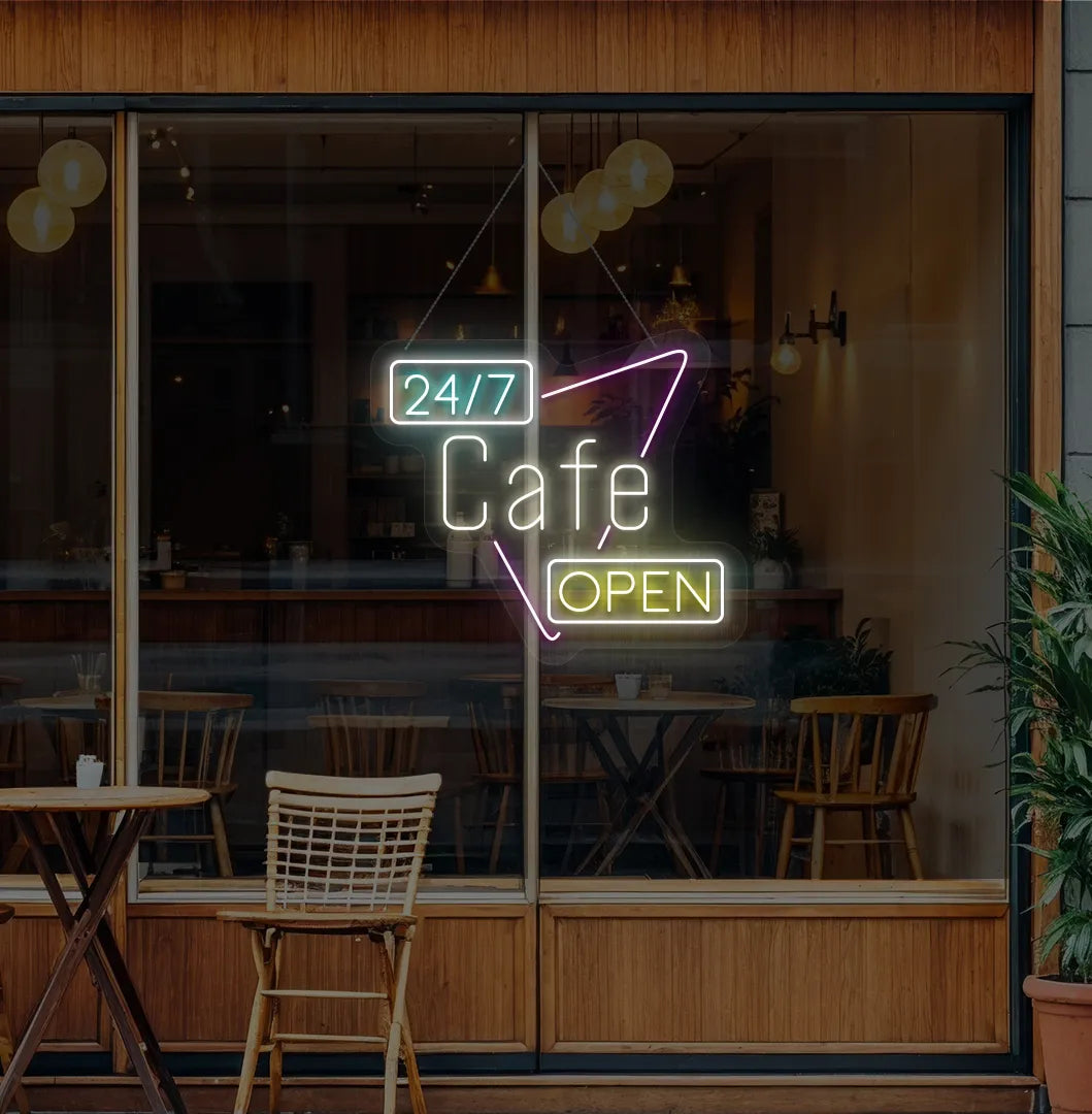 Trendy 24/7 cafe open neon sign in warm white mounted on coffee shop wall.