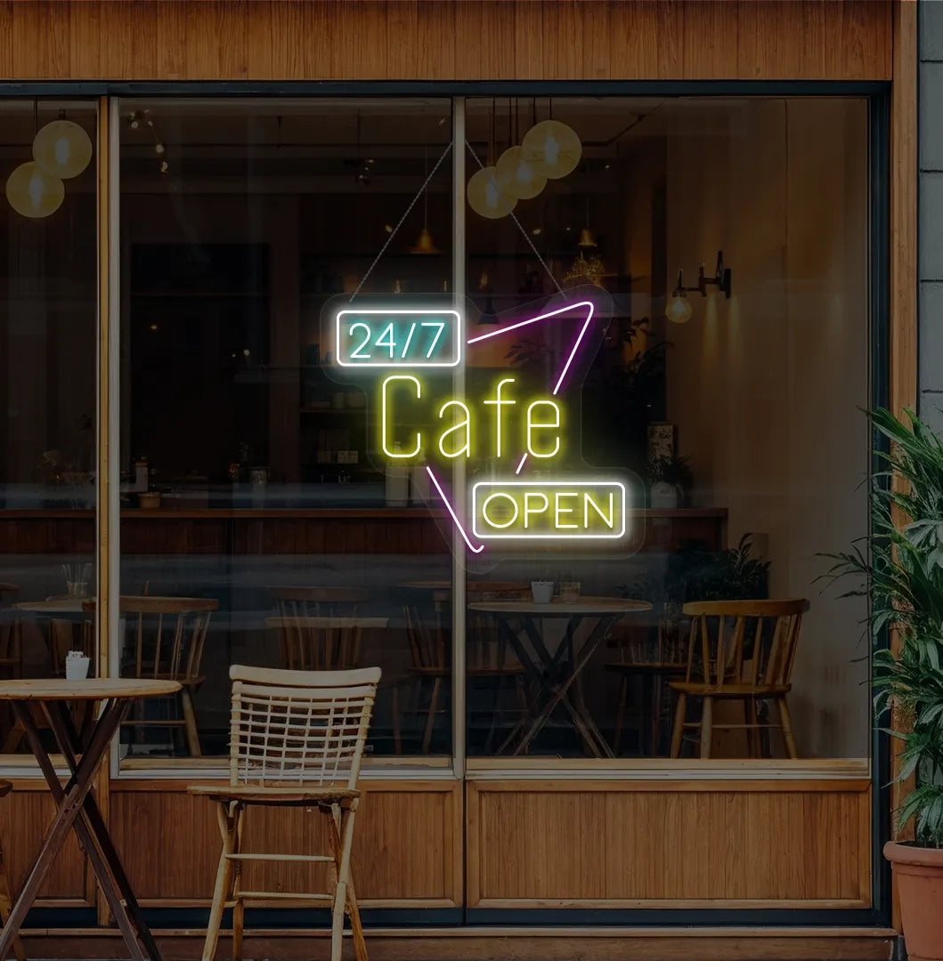 Trendy 24/7 cafe open neon sign in yellow mounted on coffee shop wall.