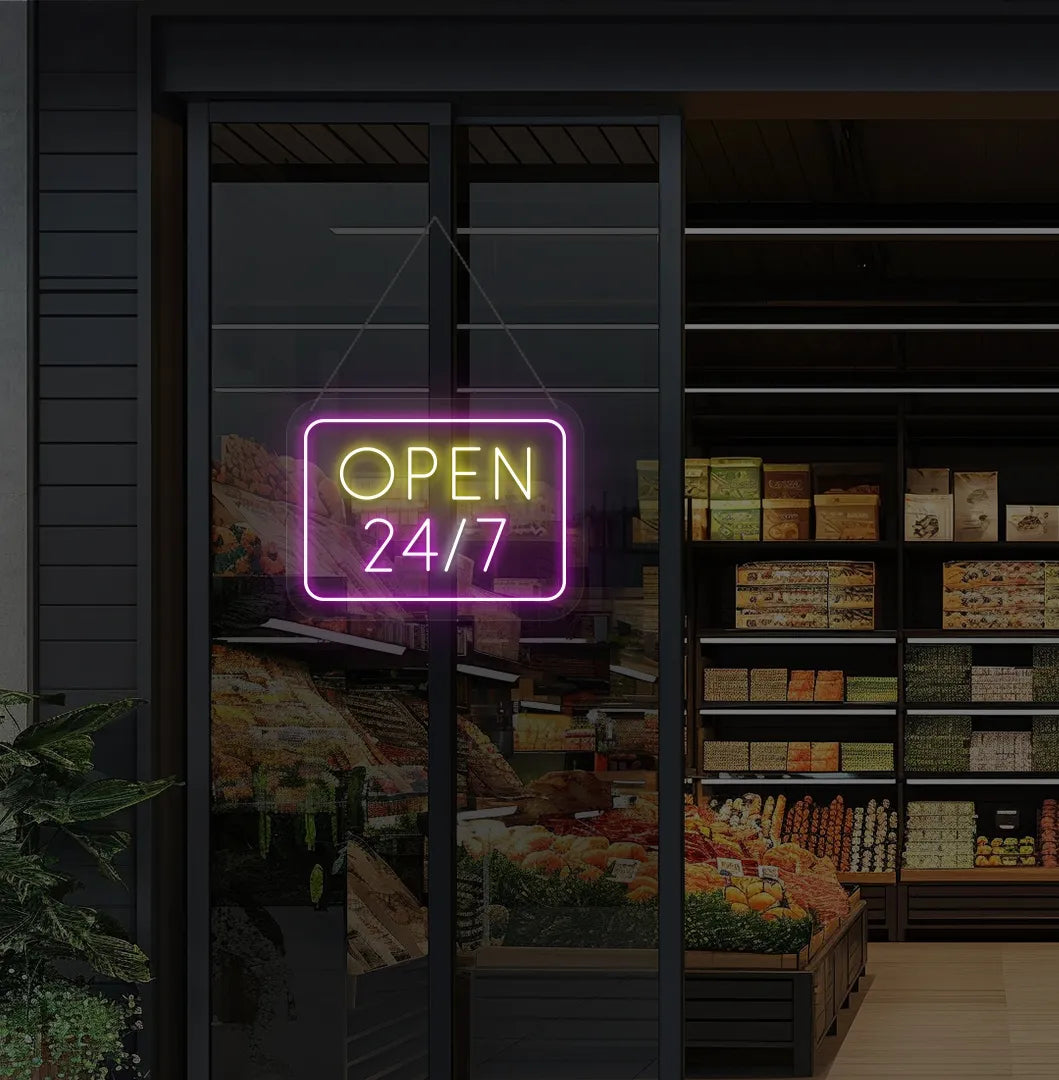 Image of storefront glass door with "24/7 open" neon sign glowing pink.