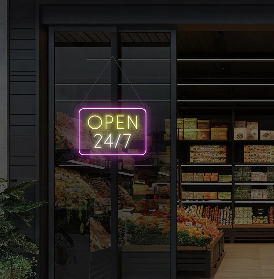 Modern storefront entrance with 24 7 open neon sign glowing warm white.