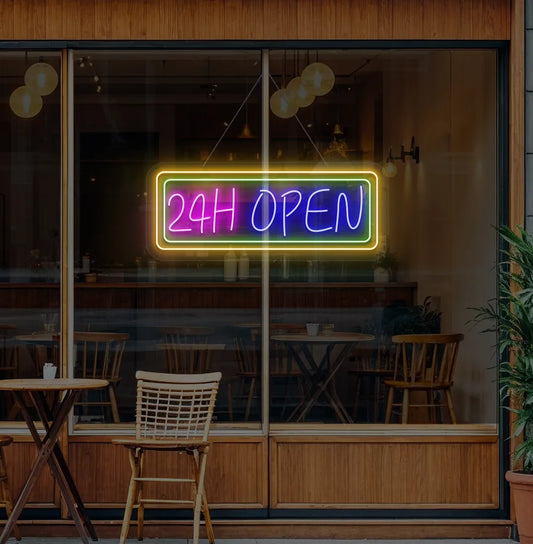 Image of a 24-Hour Open neon sign hanging on cafe glass door in blue color.