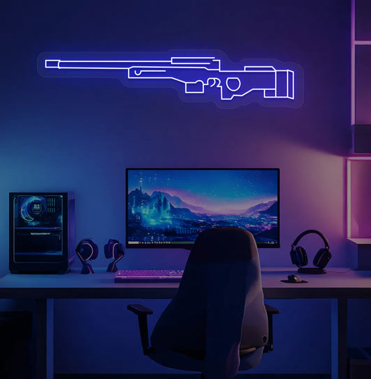 Image of a stylish AWM gaming gun neon light in blue mounted on gaming room wall.