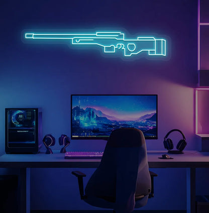 Image of a stylish AWM gaming gun neon light in ice blue mounted on gaming room wall.