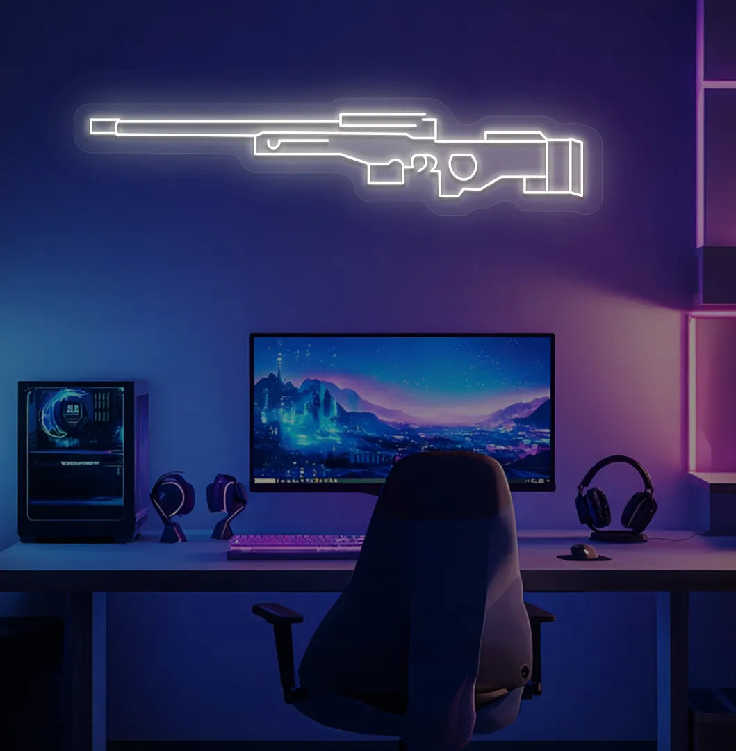 Green "AWM gaming gun" LED neon sign glowing warm white on aesthetic gaming room.