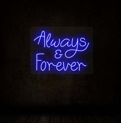 Image of an Always & Forever LED neon sign glowing on a dark wall in blue color.