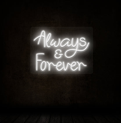 Image of an Always & Forever LED neon sign glowing on a dark wall in white color.