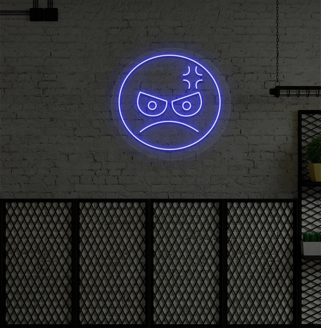 Image of an angry emoji neon sign glowing on aesthetic wall in blue color.