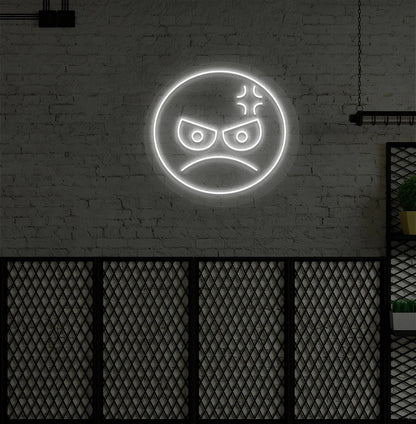 Image of an angry emoji neon sign glowing on aesthetic wall in white color.