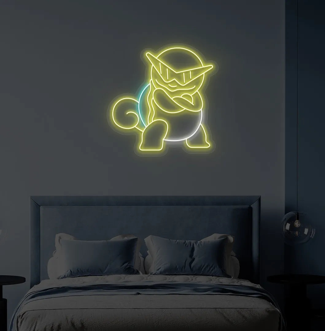 Image of an Anime-inspired turtle yellow neon sign glowing on decorative wall.