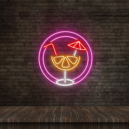 Lounge wall with "Aperol" LED neon sign glowing pink.