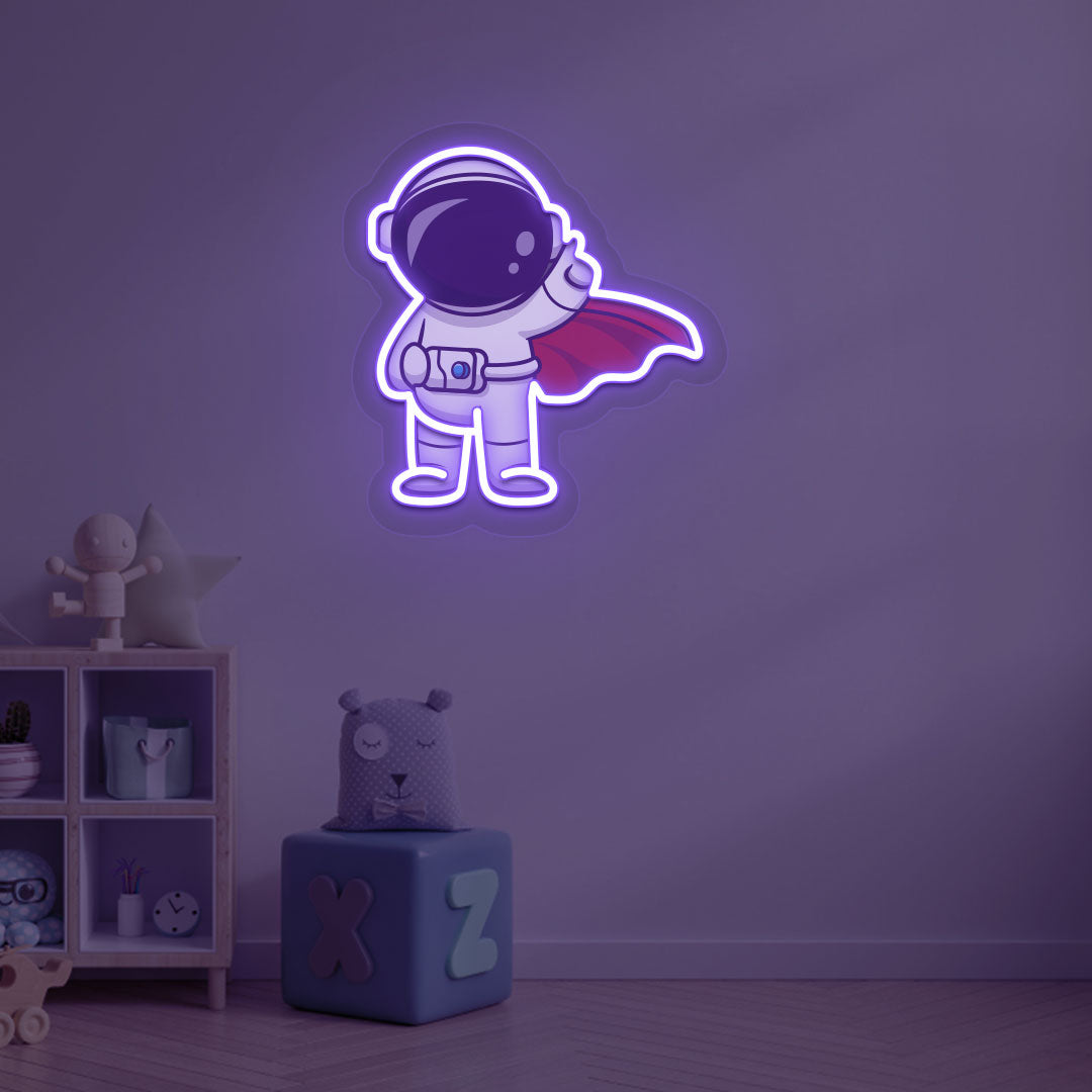 Image of a flying astronaut neon sign glowing on a kid's bedroom wall in purple color.