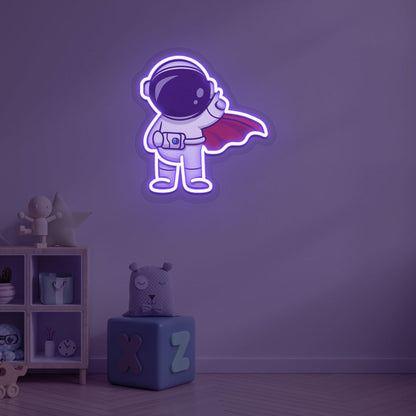 Image of a flying astronaut neon sign glowing on a kid's bedroom wall in purple color.