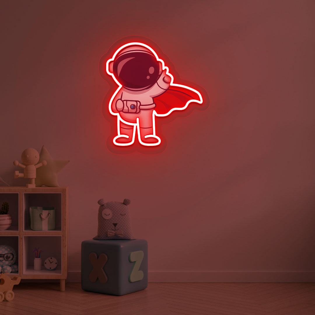 Playroom wall decor with a red LED astronaut flying neon sign. Perfect for kids’ rooms, nurseries, playrooms, space-themed interiors, and bedroom wall décor.