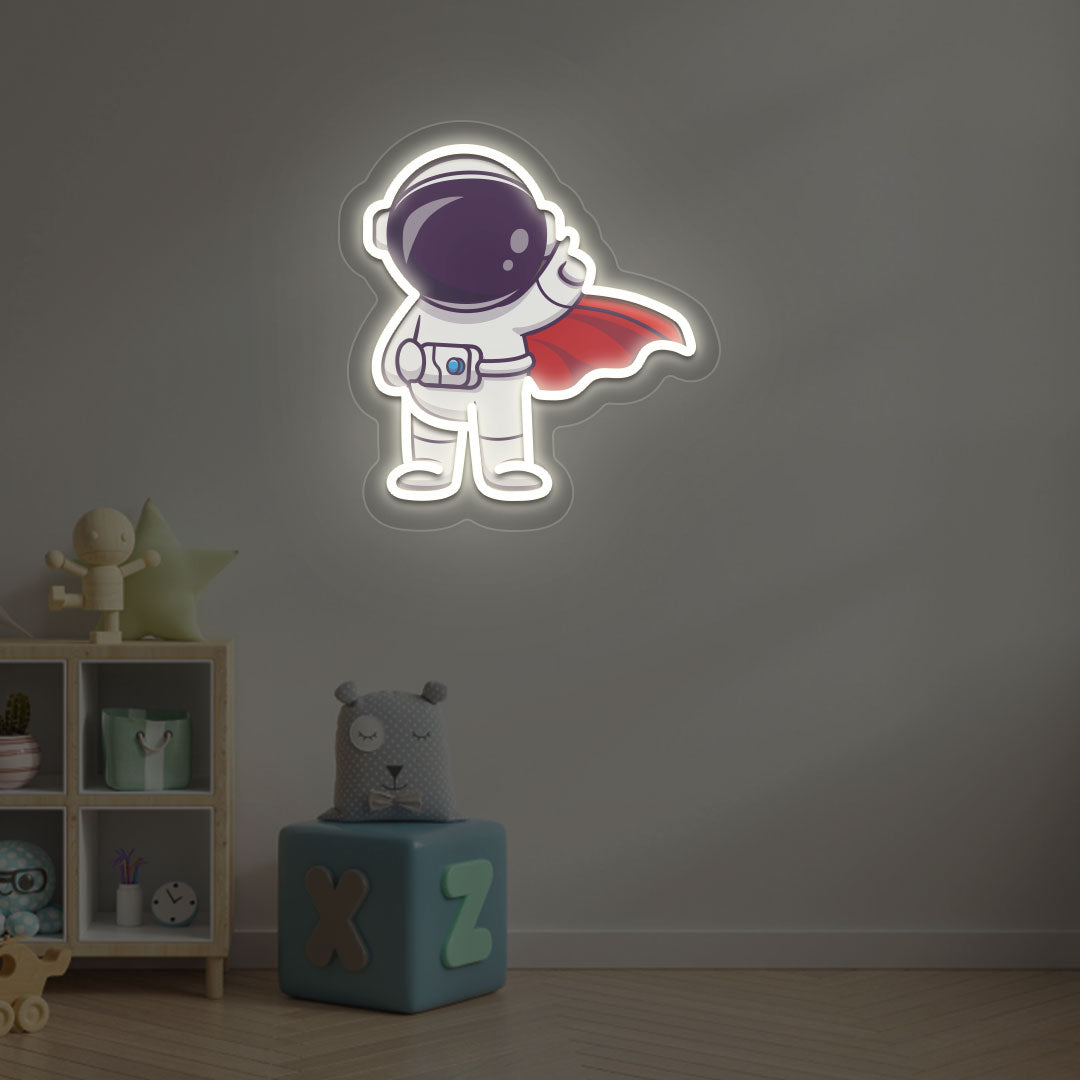 Image of a flying astronaut neon sign glowing on a kid's bedroom wall in warm white color.