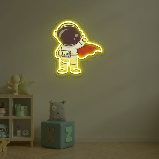 Image of a flying astronaut neon sign glowing on a kid's bedroom wall in yellow color.