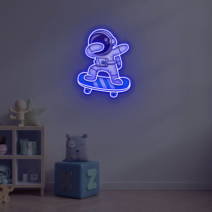 Space-themed kids' room wall with astronaut on skateboard neon sign in blue LED.