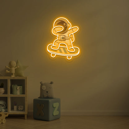 Space-themed kids' room wall with astronaut on skateboard neon sign in orange LED.