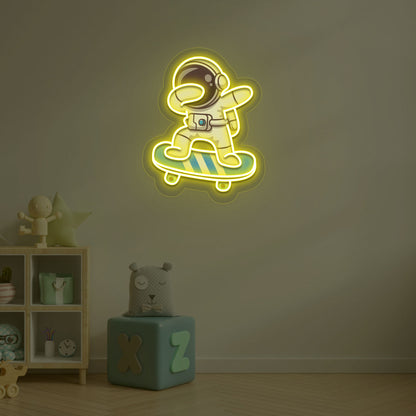 Space-themed kids' room wall with astronaut on skateboard neon sign in yellow LED.