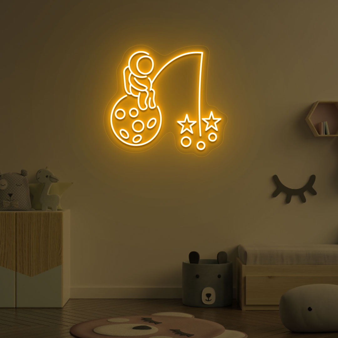 Image of an astronaut with a stars LED neon sign on a kid's room wall in orange color.