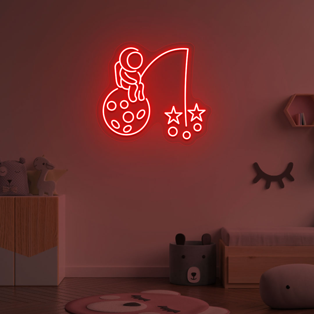 Image of an astronaut with a stars LED neon sign on a kid's room wall in red color.