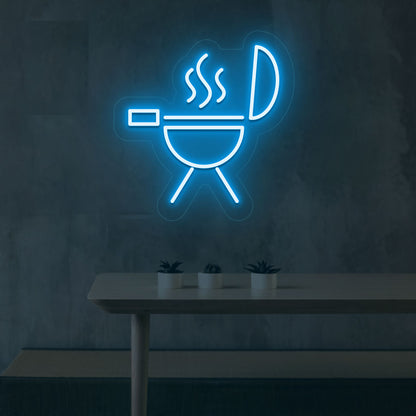 Barbeque wall decor with an ice blue LED BBQ neon sign and grill icon. Perfect for BBQ restaurants and food outlets.