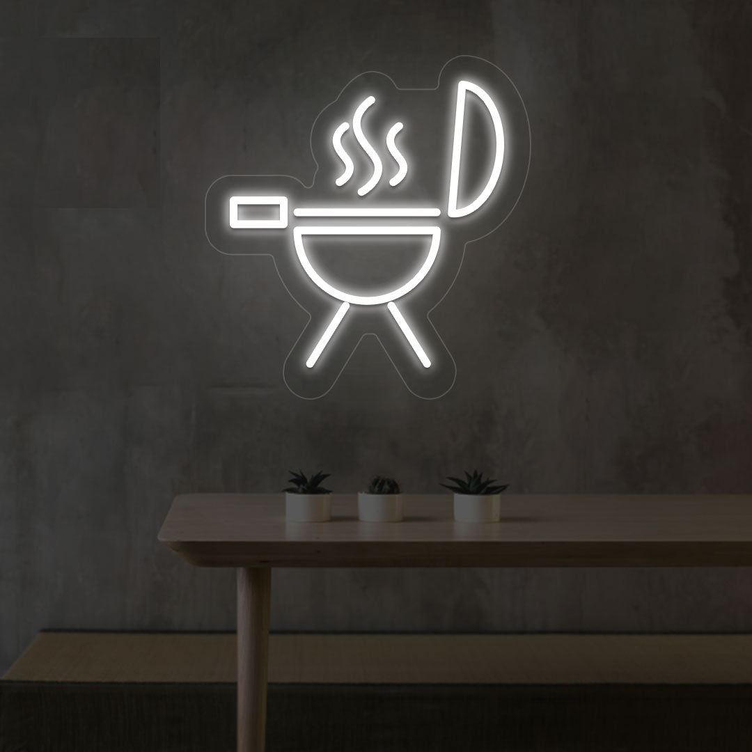 Image of a BBQ neon sign grill machine symbol glowing on a wall in whie color.