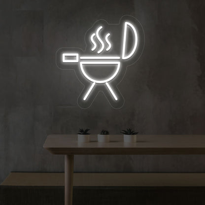 Image of a BBQ neon sign grill machine symbol glowing on a wall in whie color.