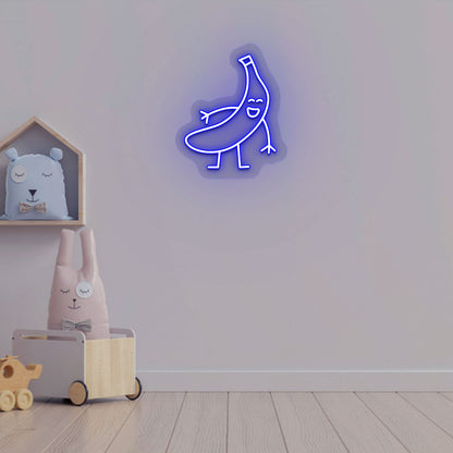 Playroom wall decor with a banana neon sign in blue LED. Perfect for kids’ rooms, nursery wall décor, and bedroom décor.