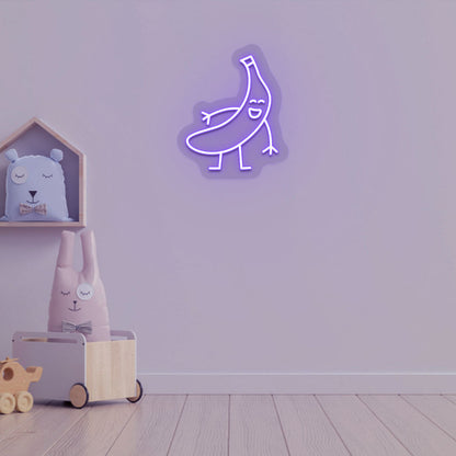 Playroom wall decor with a banana neon sign in purple LED. Perfect for kids’ rooms, nursery wall décor, and bedroom décor.