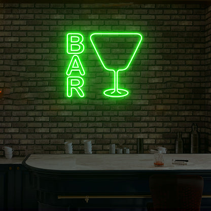 Stylish bar neon sign in green with glass design on modern wall.