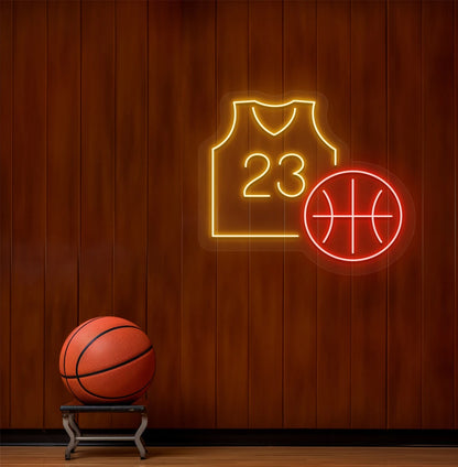 Basketball neon sign glowing orange above basketball on aesthetic dressing room wall.