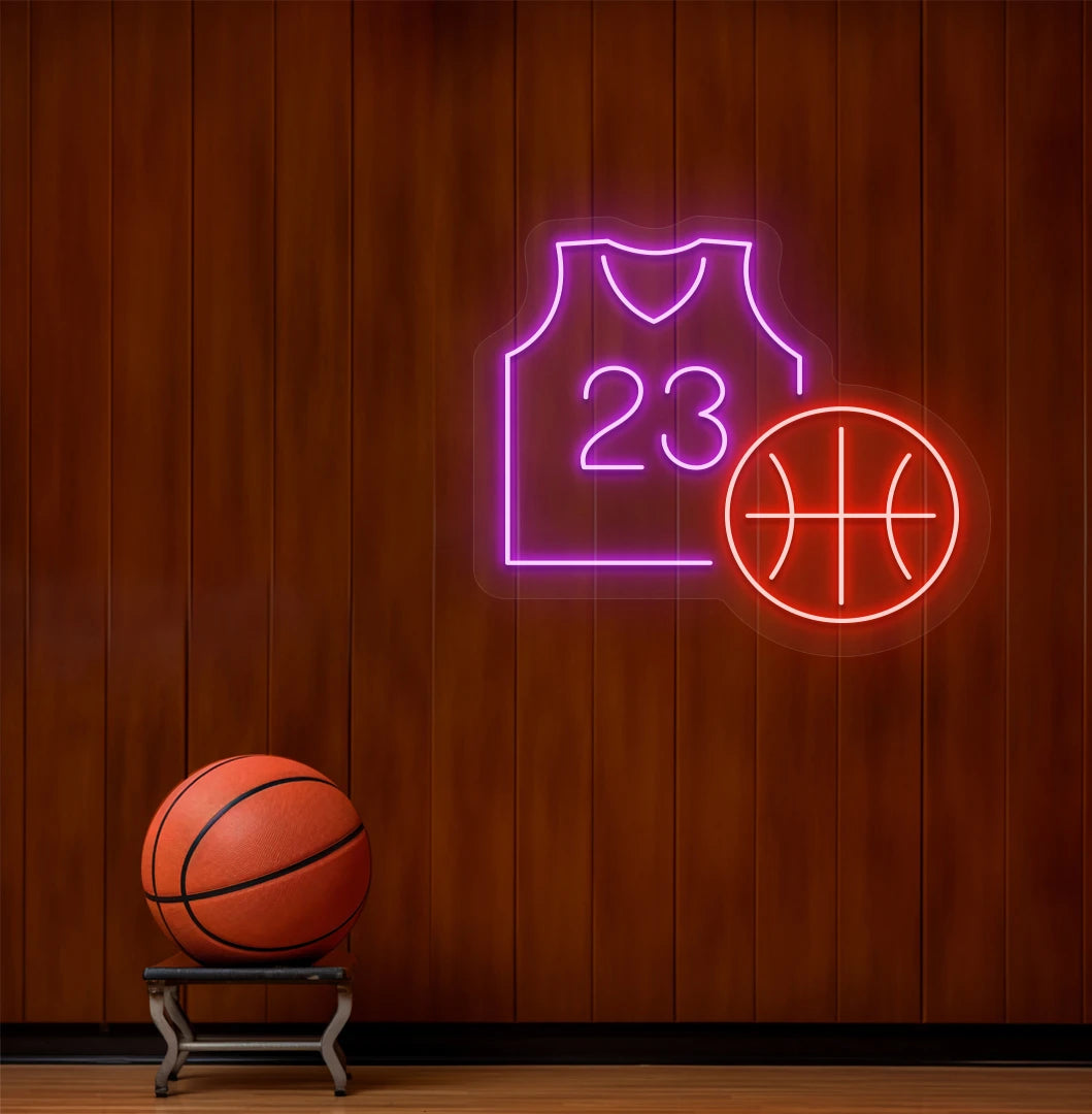 Basketball neon sign glowing pink above basketball on aesthetic dressing room wall