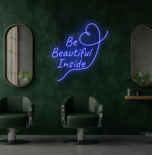 Image of an aesthetic salon wall with "be beautiful inside" neon sign glowing blue.