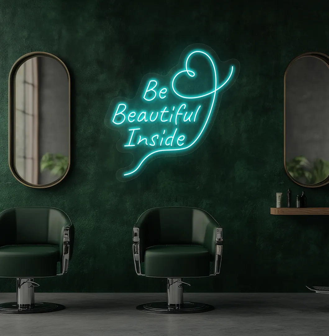 Image of an aesthetic salon wall with "be beautiful inside" neon sign glowing ice blue.