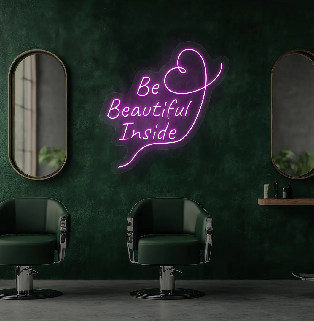 Image of an aesthetic salon wall with "be beautiful inside" neon sign glowing pink.
