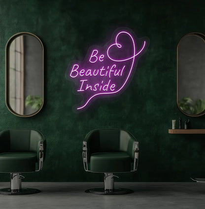 Image of an aesthetic salon wall with "be beautiful inside" neon sign glowing pink.