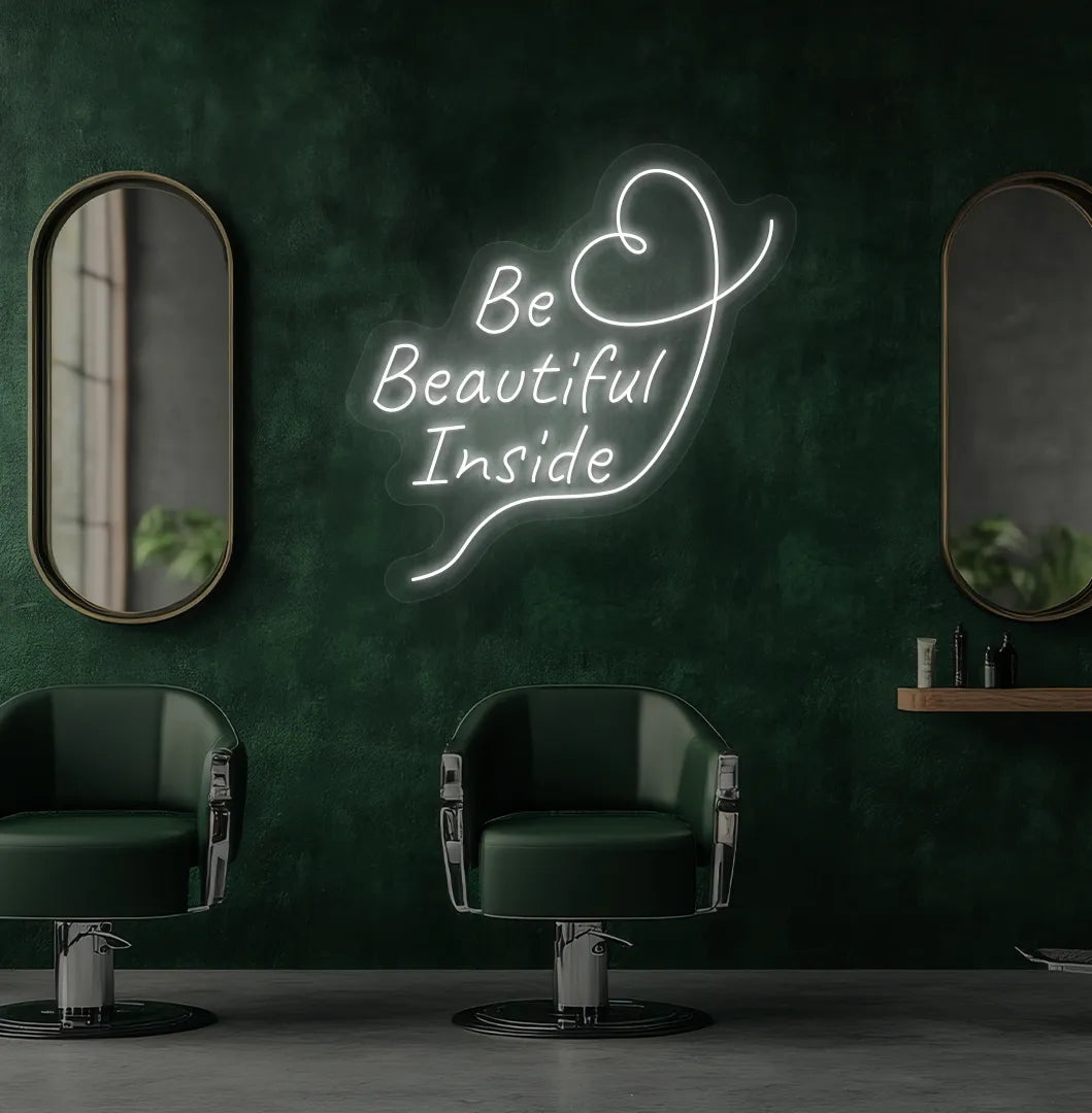 Image of an aesthetic salon wall with "be beautiful inside" neon sign glowing white.