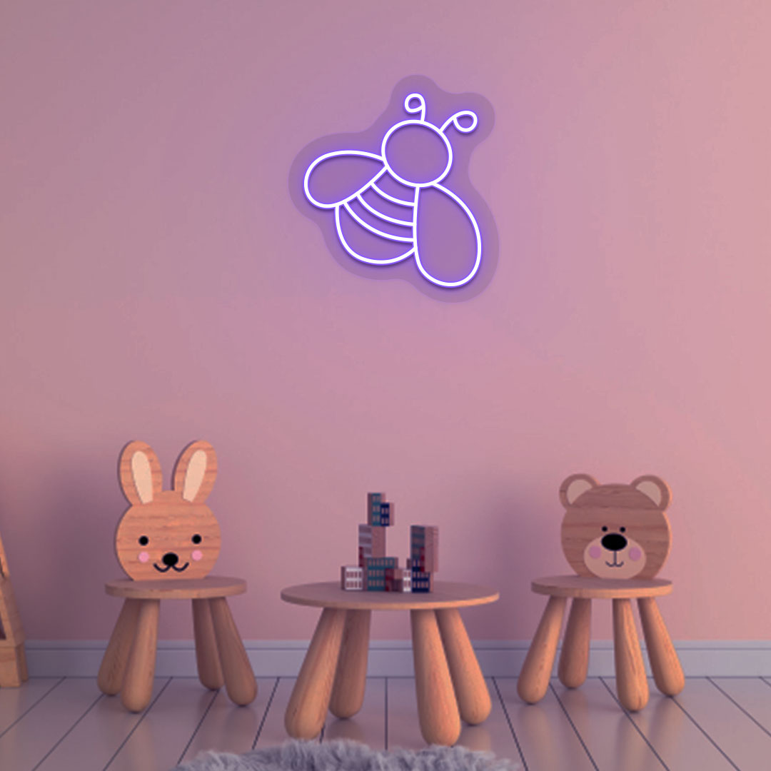 Bright kids' bedroom wall decor with purple bee neon sign symbol. Perfect for a playroom or kids' room.