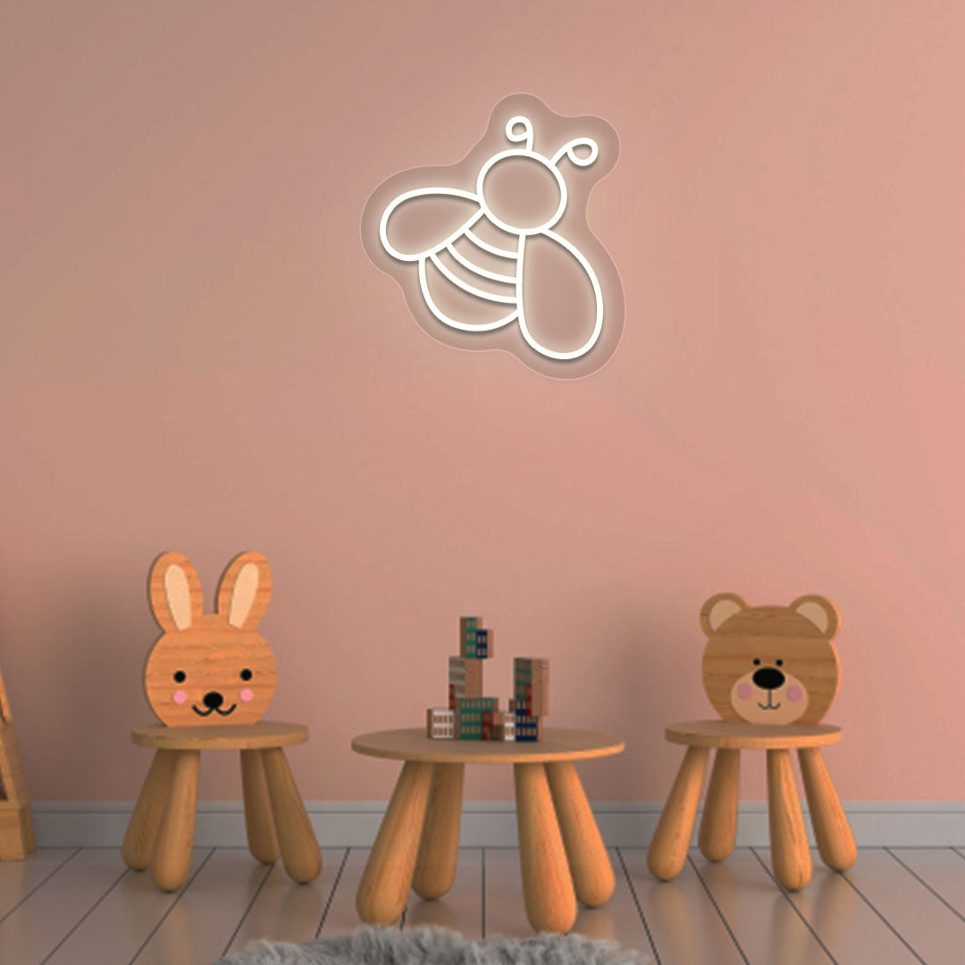 Bright kids' bedroom wall decor with warm white bee neon sign symbol. Perfect for a playroom or kids' room.