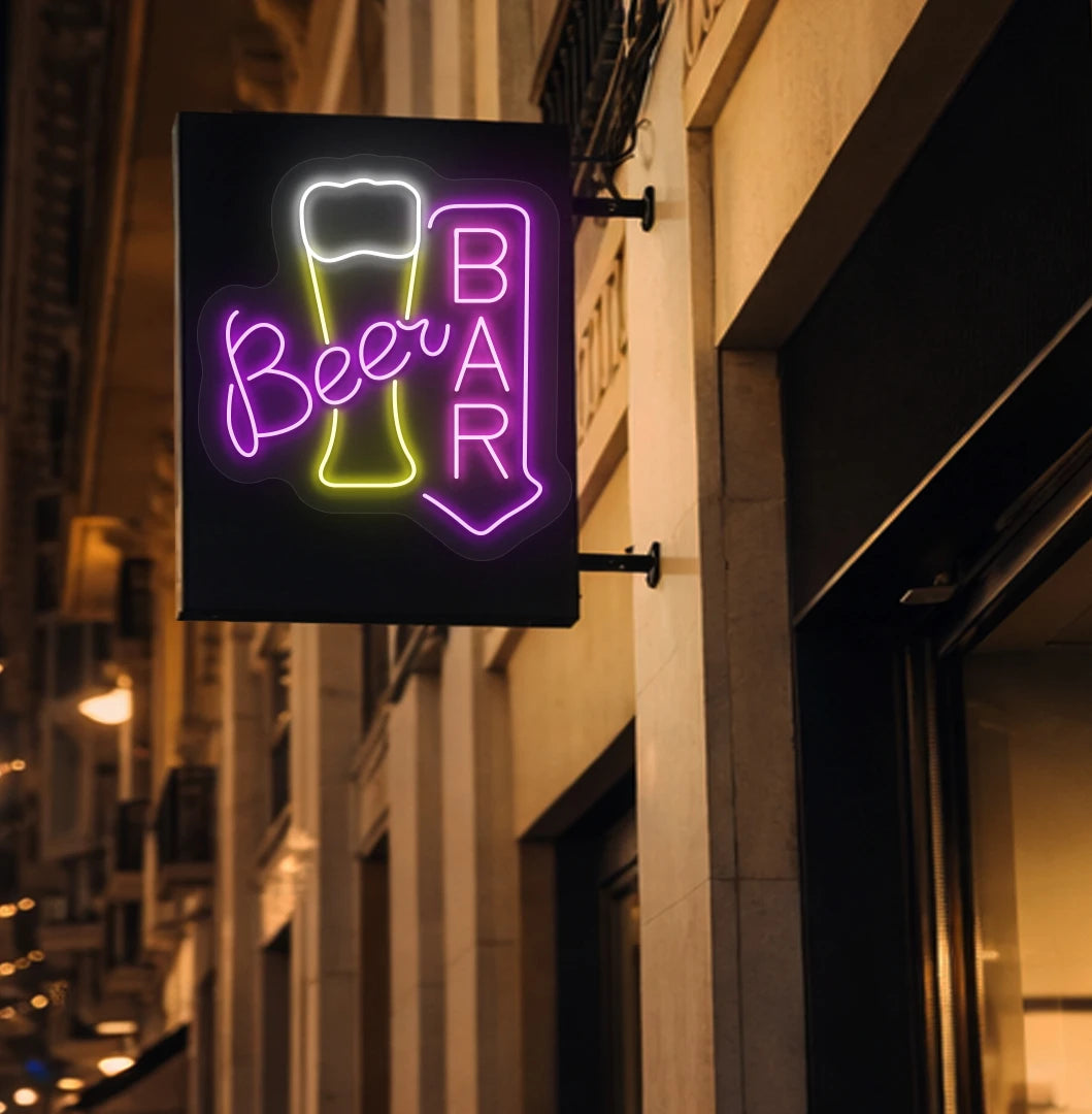 Image of a stylish "beer bar arrow neon sign" mounted on aesthetic wall in pink color.